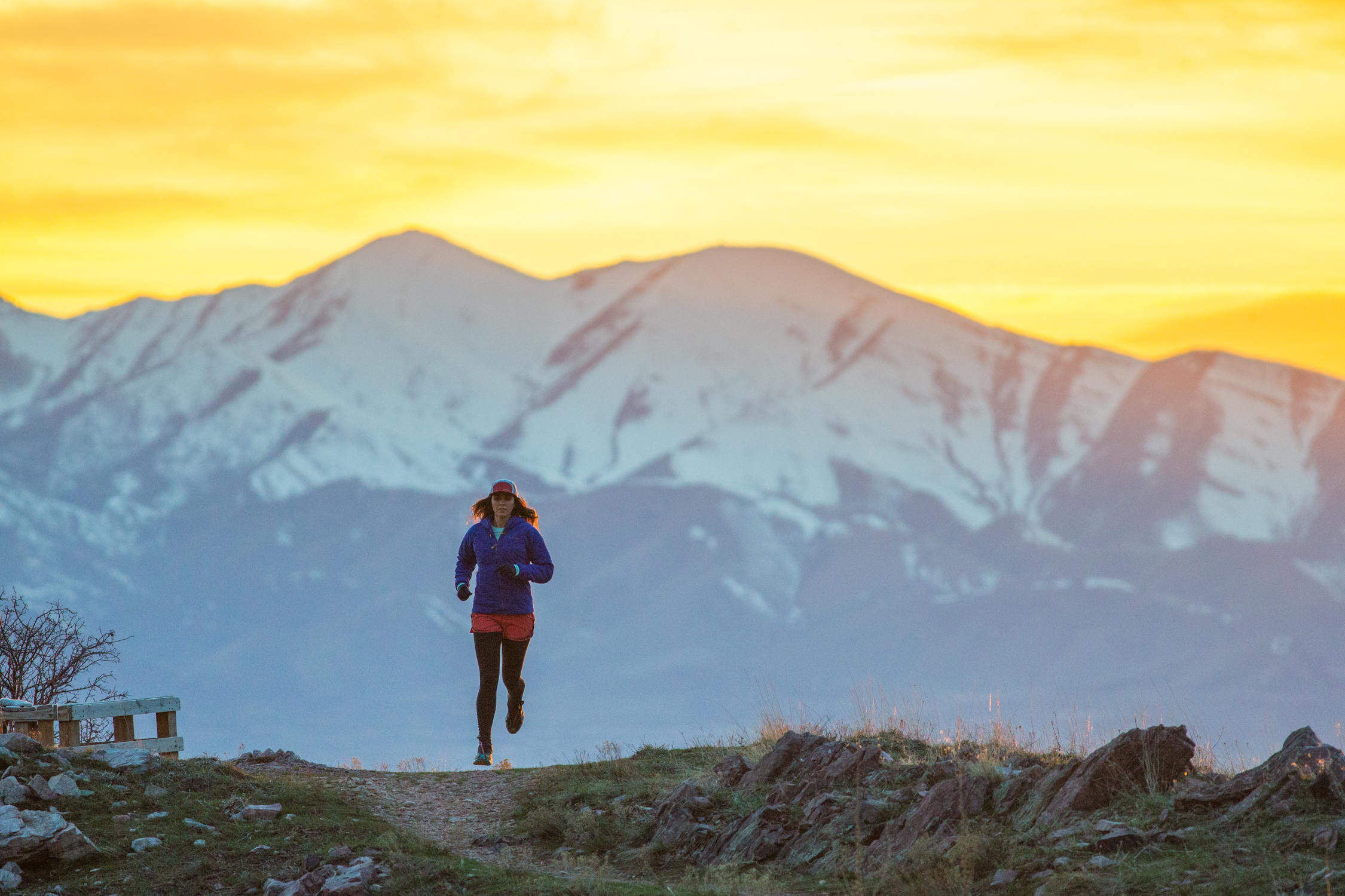 Trail Running in Mountains wearing Patagonia Micro Puff Jacket Trail Running in Mountains wearing Patagonia Micro Puff Jacket